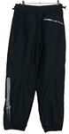 Pánské černé vzorované šusťákové funkční kalhoty zn. Nike vel. 31/33