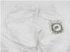 Bílé šusťákové 3/4 kalhoty s logem zn. Nike 