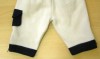 Béžovo-tmavomodré fleecové kalhoty
